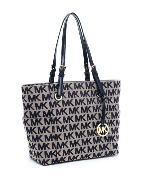 michael michael kors black monogram bag gold hardware|Michael Kors monogram tote bag.